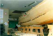 Sewing at backboard side of Boat , 1998-08-13.